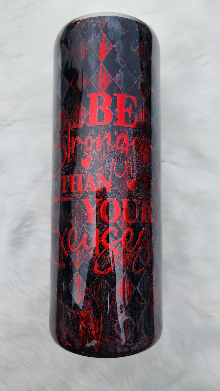 "Glossy tumbler with a dark gothic design featuring a queen-like woman with black wavy hair, blue eyes, and a jeweled crown with a red heart. She wears a black corset and lace sleeves, holding a large red heart in her hands. The background includes roses, playing card suits, and a red-and-black diamond harlequin pattern."